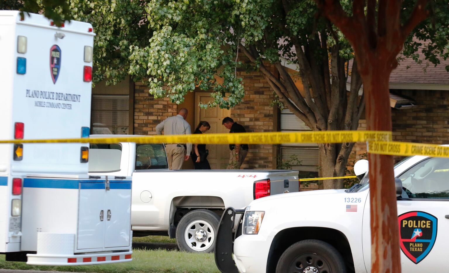 Plano police and the Texas Rangers work the scene of the shooting on Monday morning. 
