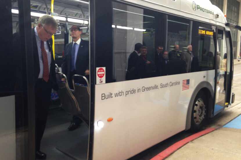 DART officials took a look at an electrically powered bus on Tuesday. The transit agency is...