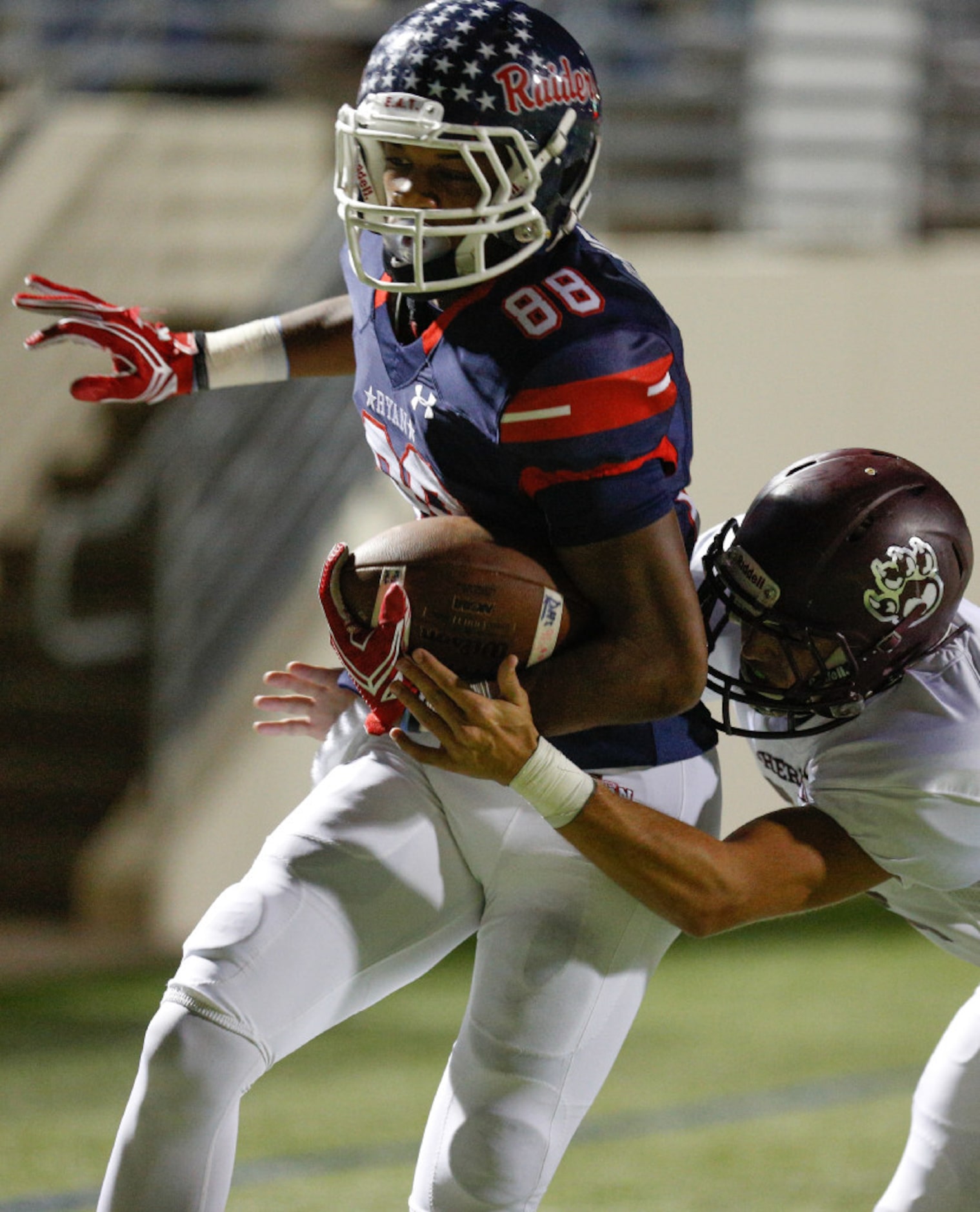 Ryan junior wide receiver Chritauskie Dove (88) makes a catch and runs the ball in for the...