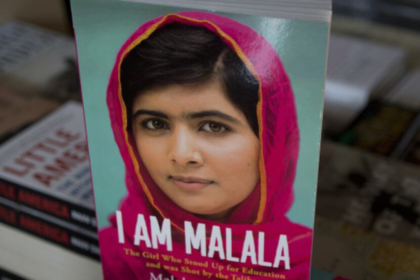 Copies of a newly published book about Malala Yousafzai are on display at a bookstore in...