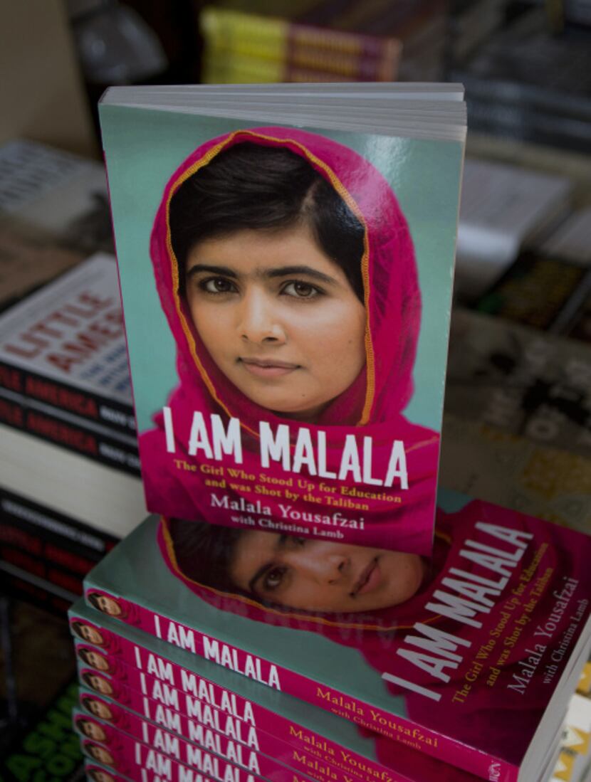 Copies of a newly published book about Malala Yousafzai are on display at a bookstore in...