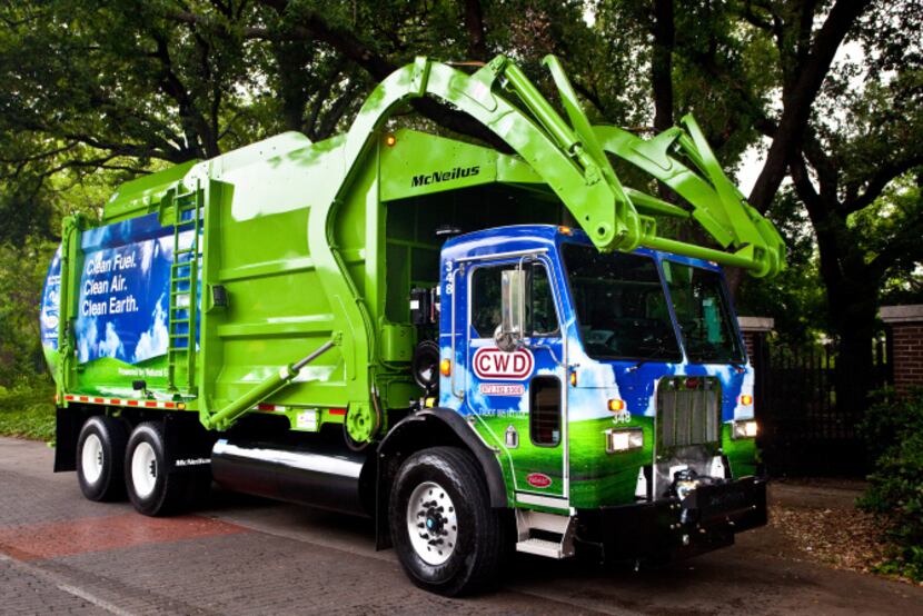 Community Waste Disposal is collecting trash in the Dallas-Fort Worth area with trucks that...