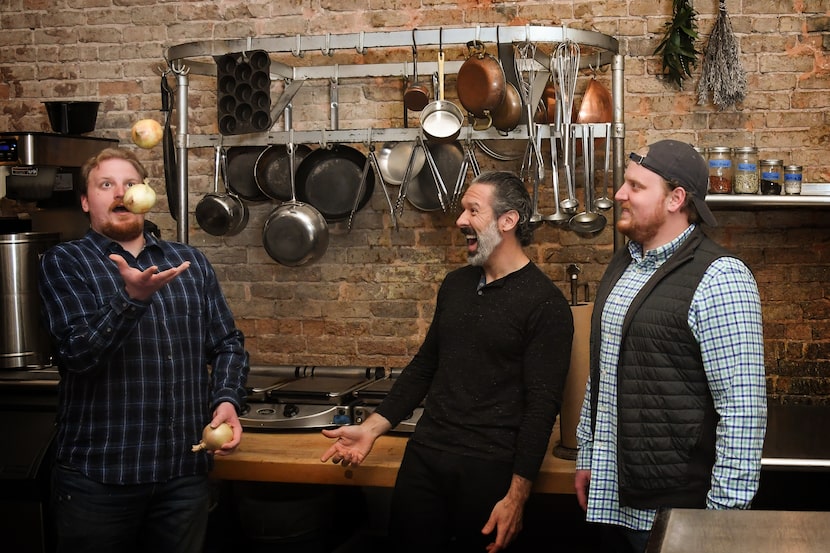 Chef Robert Lyford, center, is sharing his recipes with twins Trevor and Tyler Hanes.