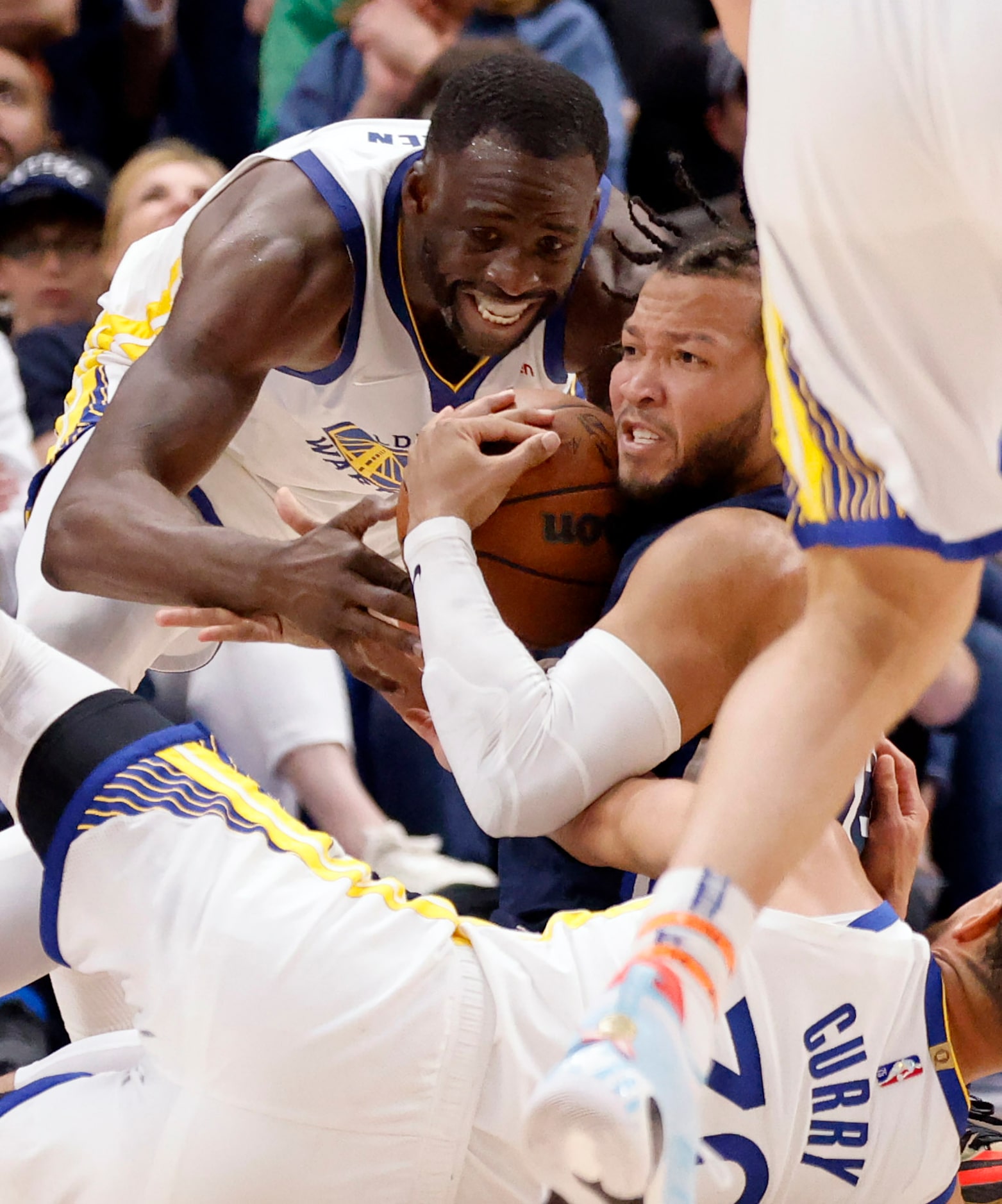 Dallas Mavericks guard Jalen Brunson (13) battles Golden State Warriors forward Andrew...