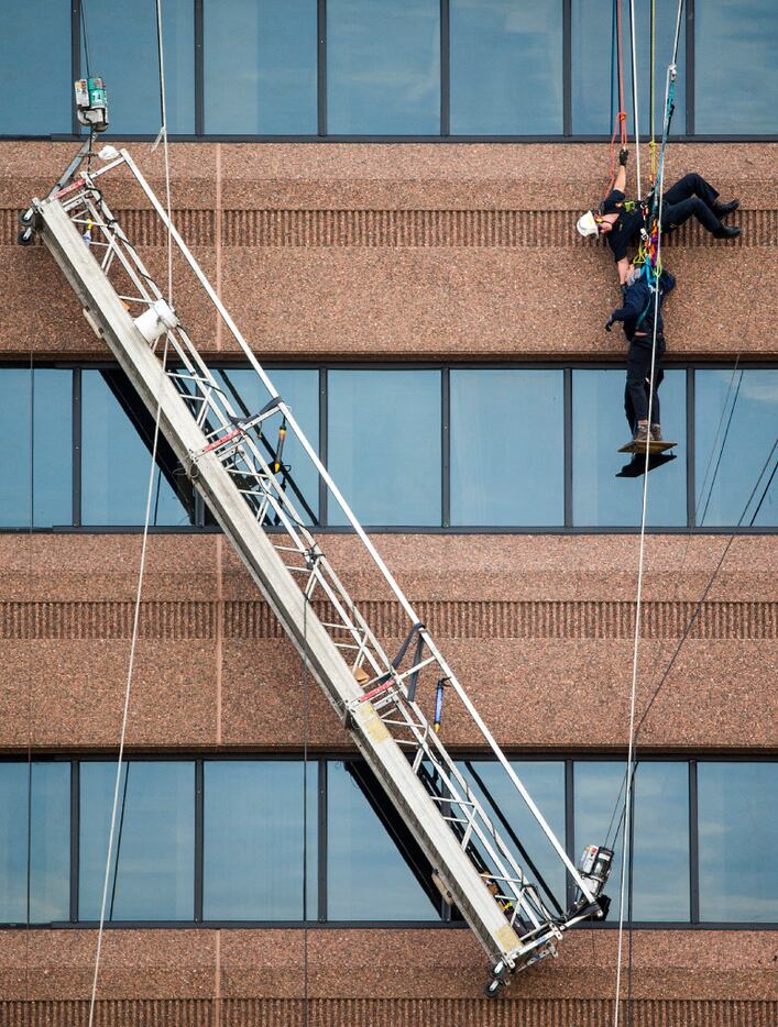 Jonathan Formby of  Dallas Fire Department  Urban Search and Rescue performs a high angle...