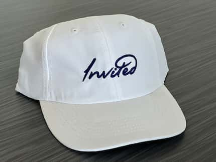 The Dallas-based company formerly known as ClubCorp's new Invited branding on a ballcap.