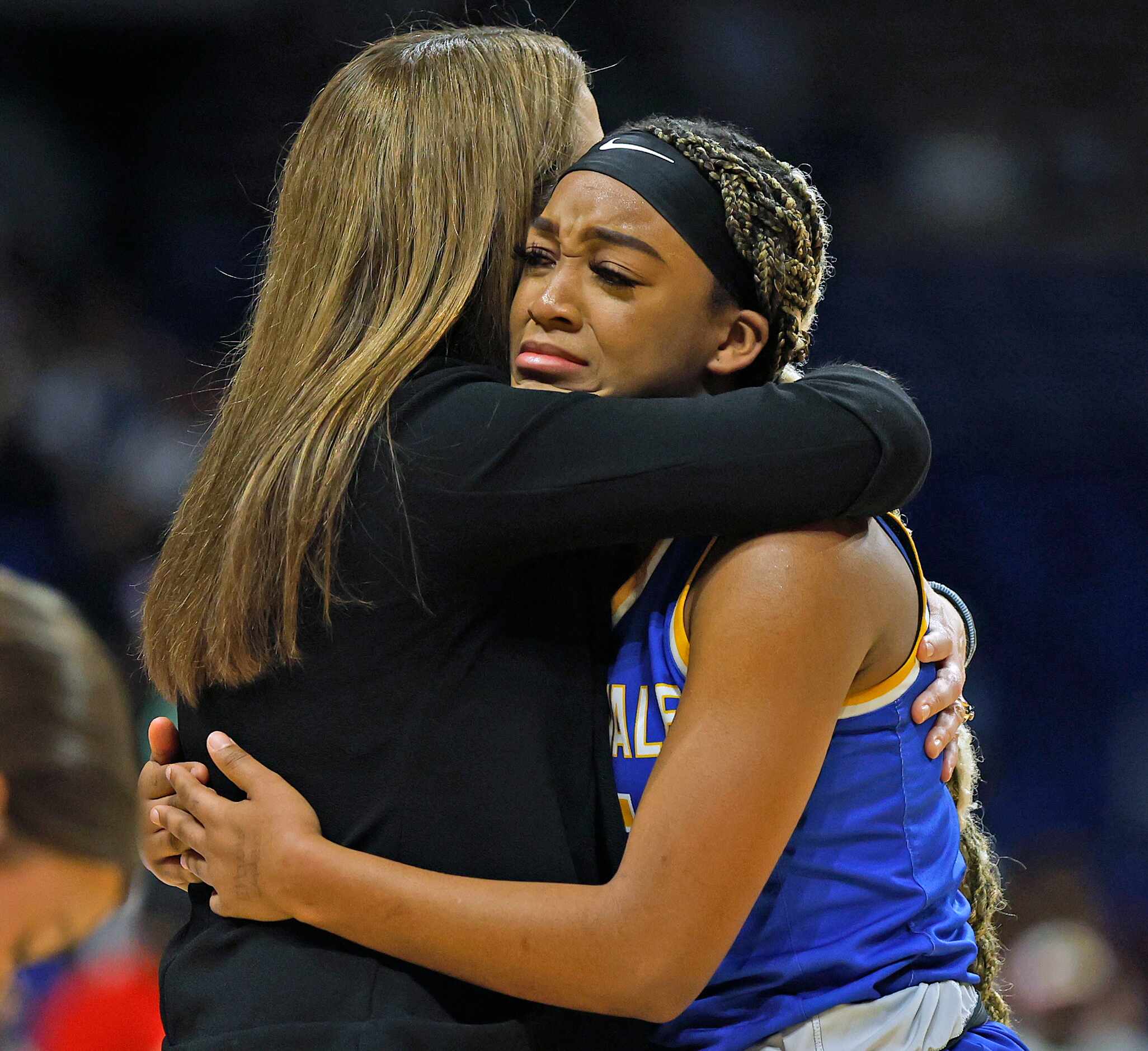 Sunnyvale head coach Jill McDill comes over to console Sunnyvale Sidney Williams (5) in...