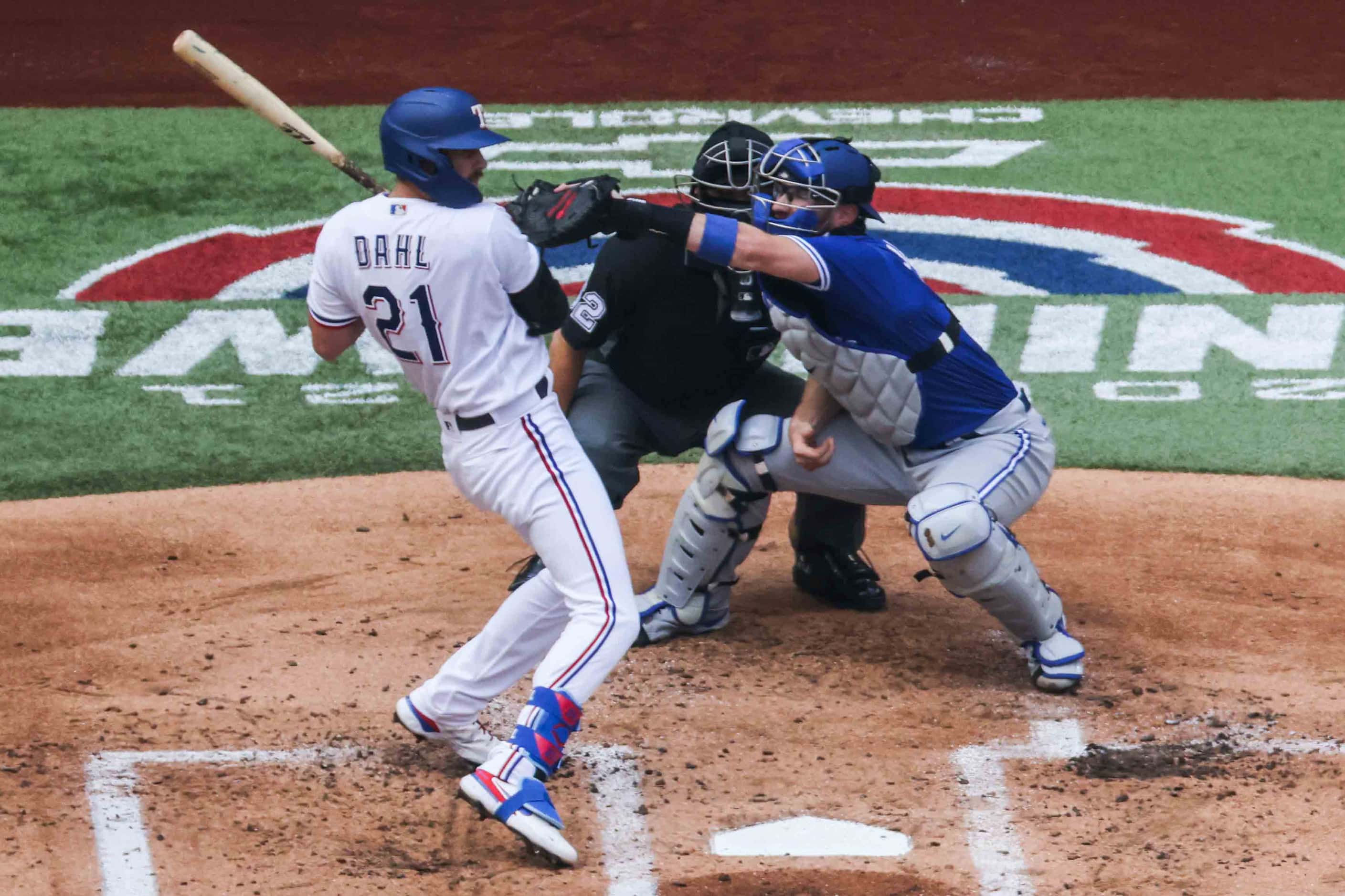 Texas Rangers's David Dahl No.21  dodges a ball in home plate at the Globe Life Field during...