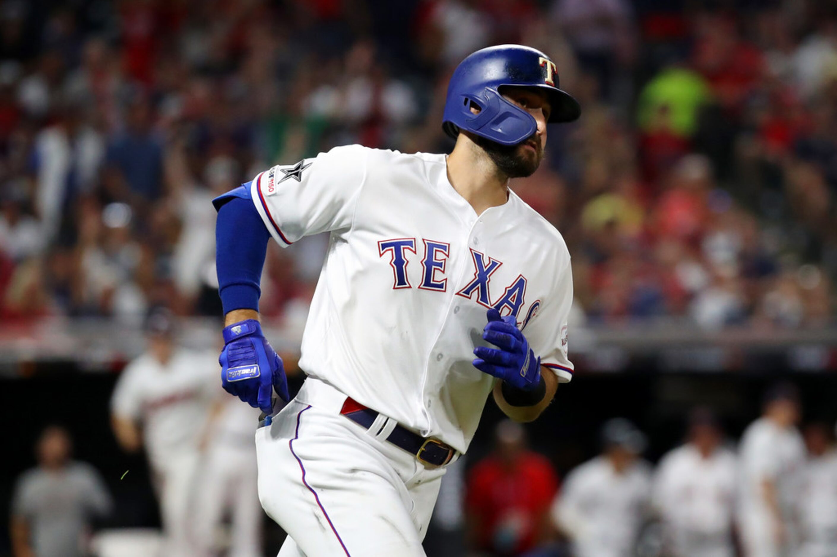 CLEVELAND, OHIO - JULY 09: Joey Gallo #13 of the Texas Rangers and the American League runs...