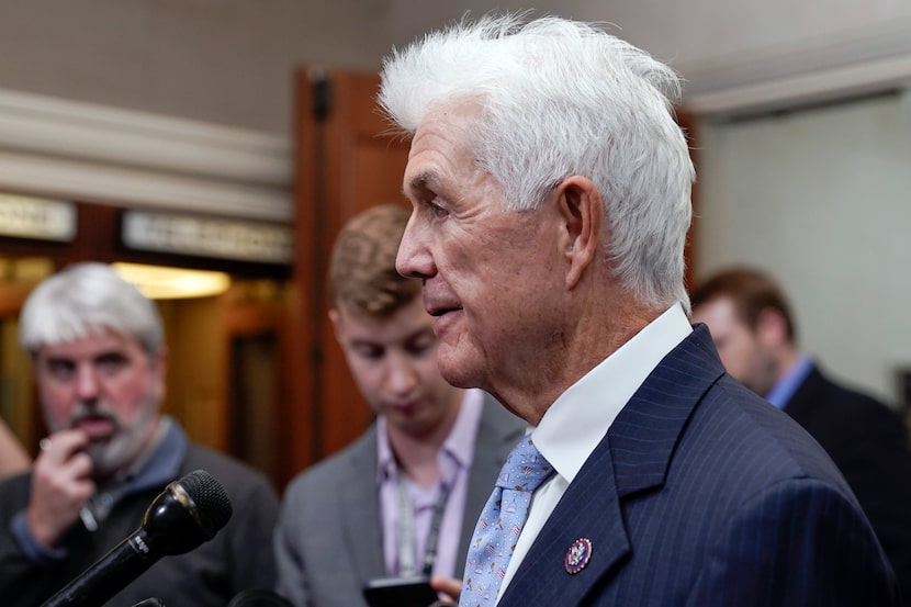 Rep. Roger Williams, R-Texas., talks with reporters as Republicans hold a caucus meeting at...