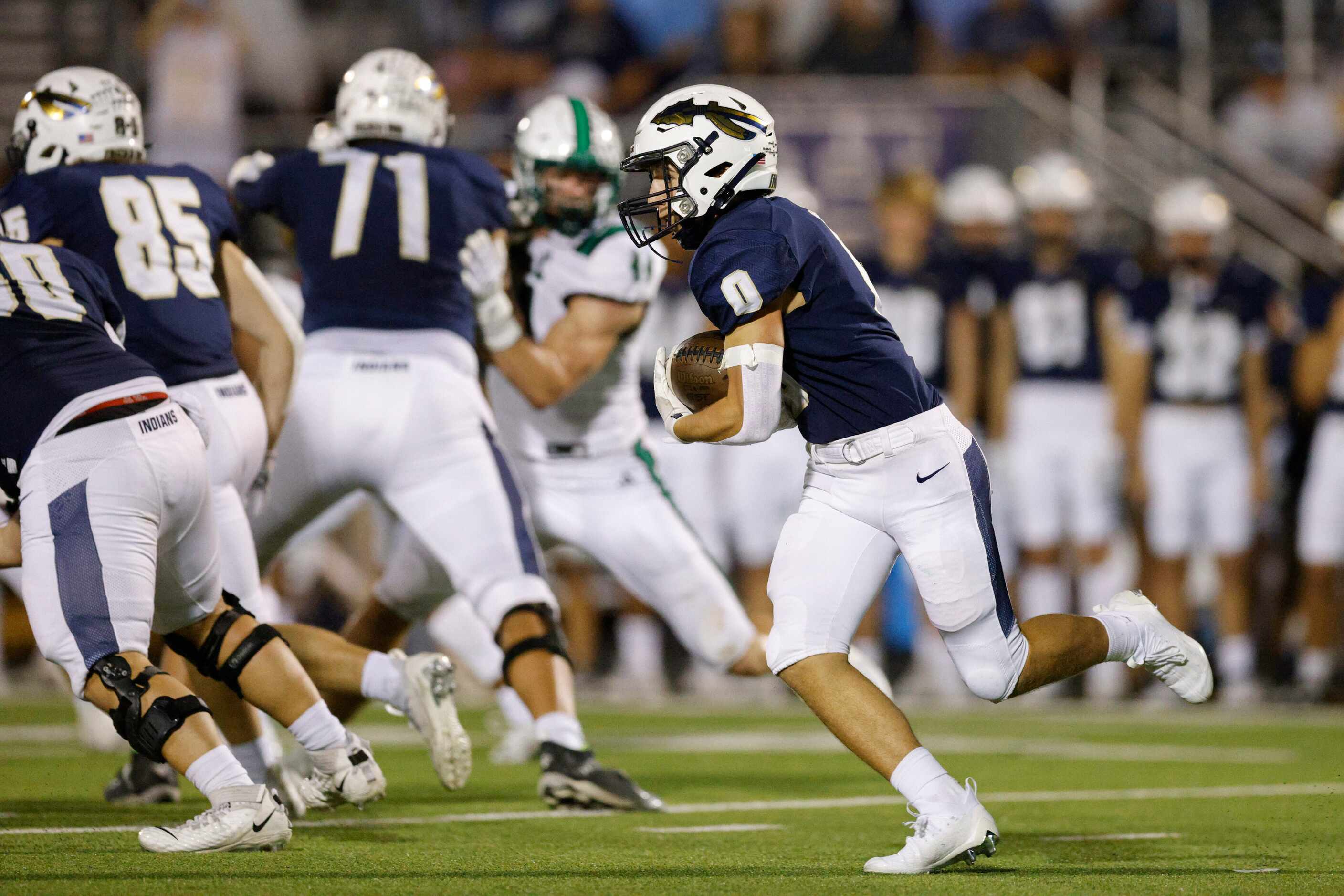 Keller running back Kyle Owens (11) runs the ball during the first half of a District 4-6A...