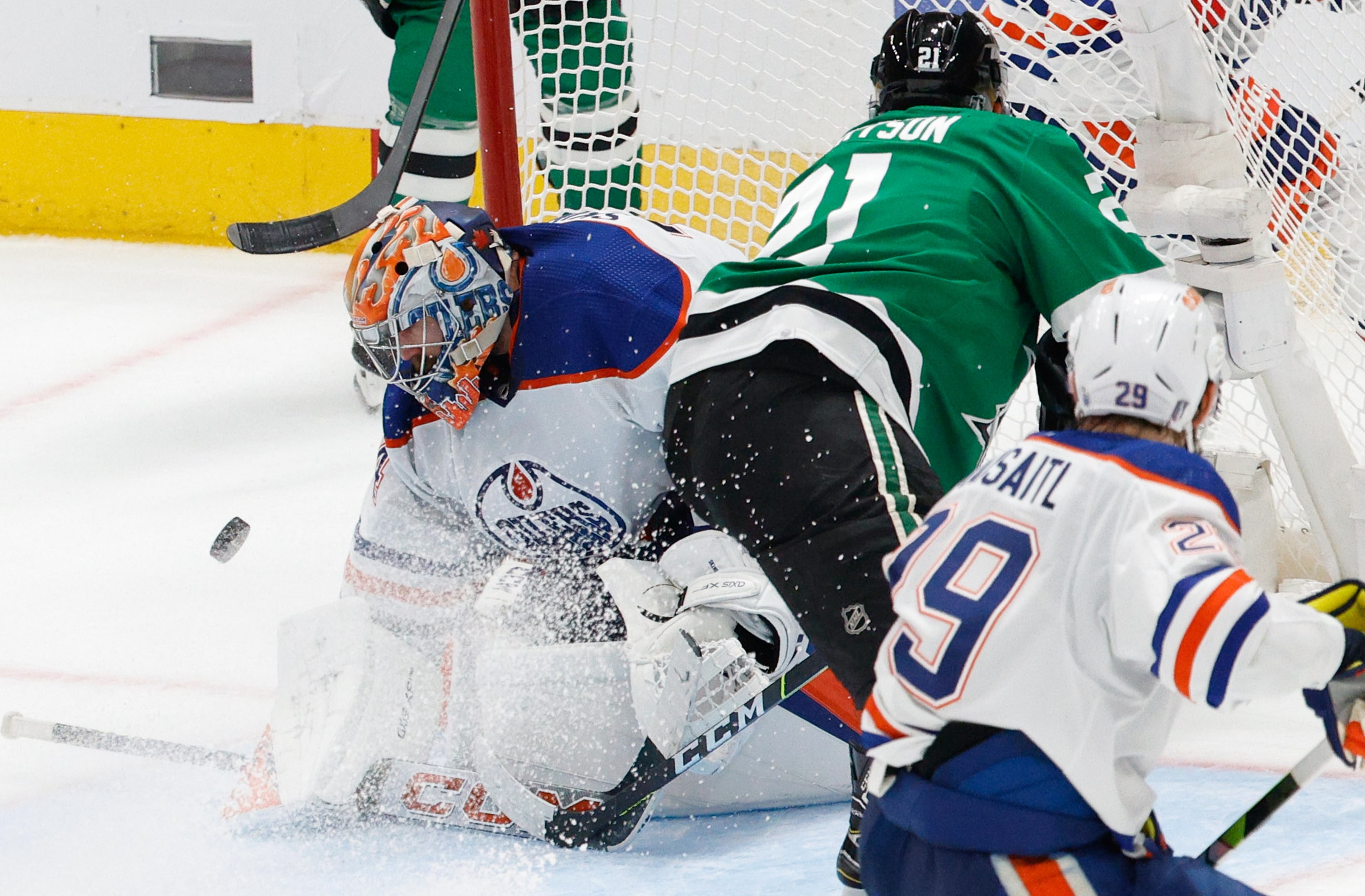 Edmonton Oilers goaltender Stuart Skinner (74) makes a save against Dallas Stars left wing...