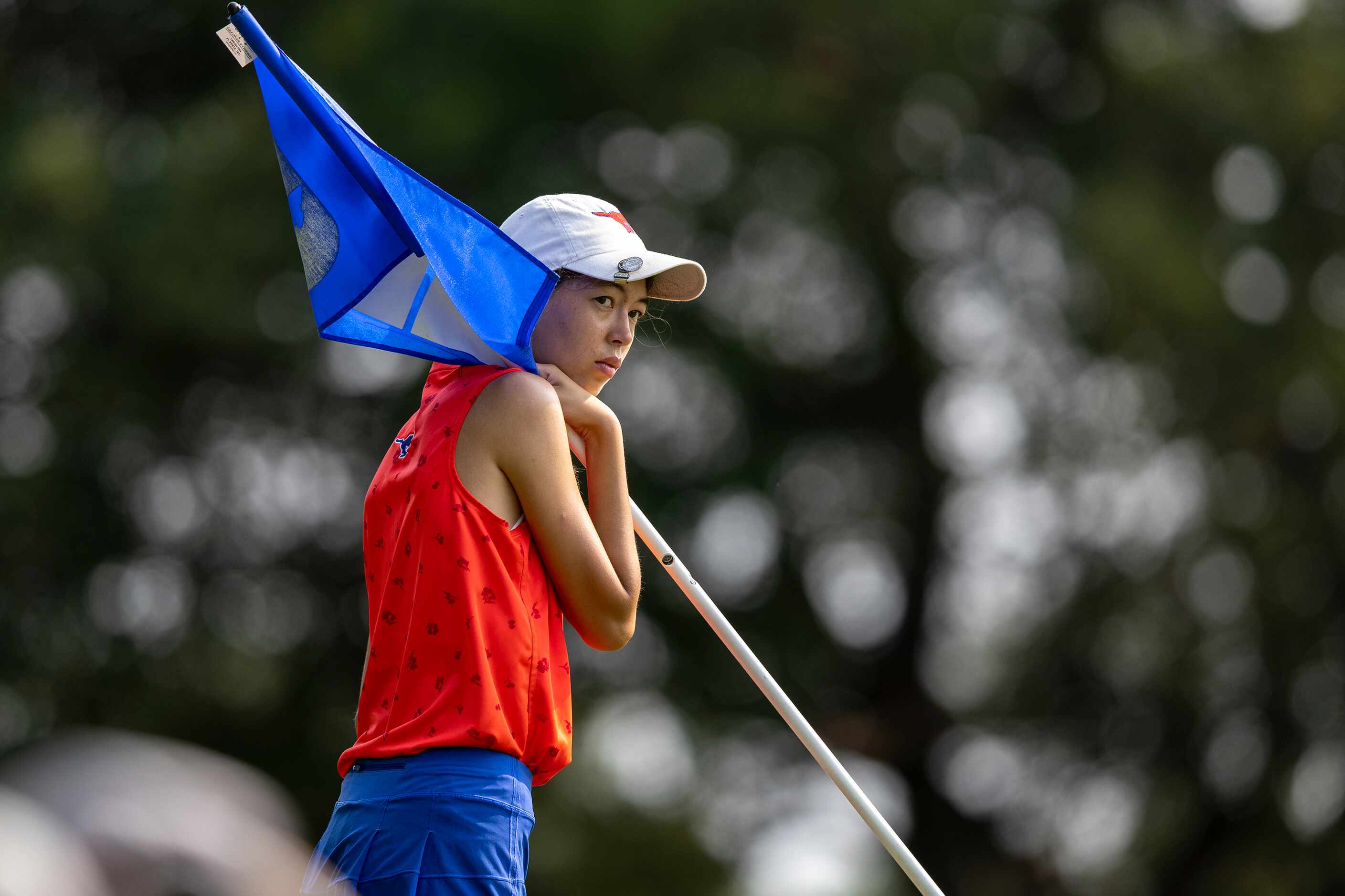 Grapevine’s Alaina Kubo waits to putt on the 10th green during the 5A girls state golf...
