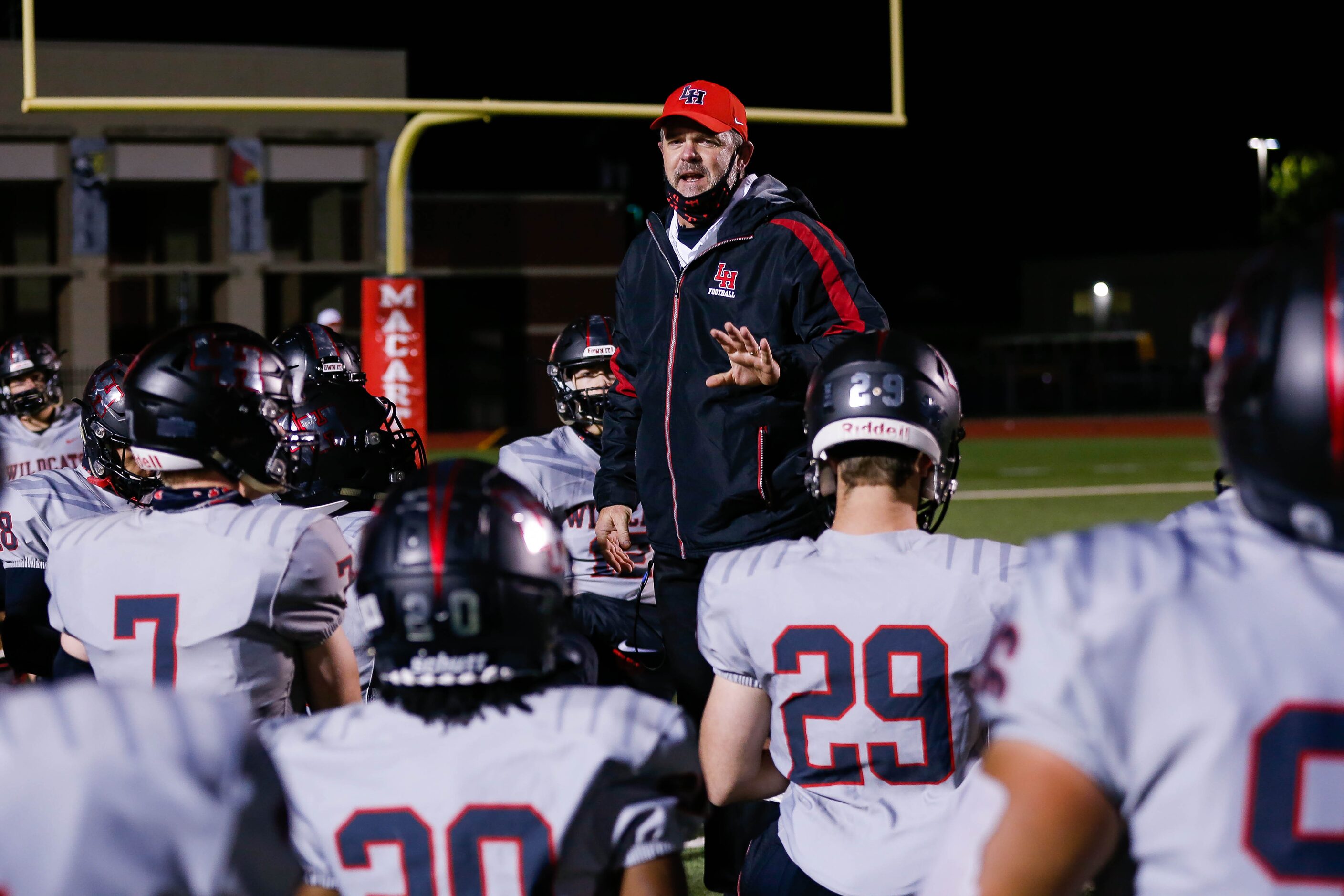 Lake Highlands' coach Lonnie Jordan speaks to his team after winning against Irving...