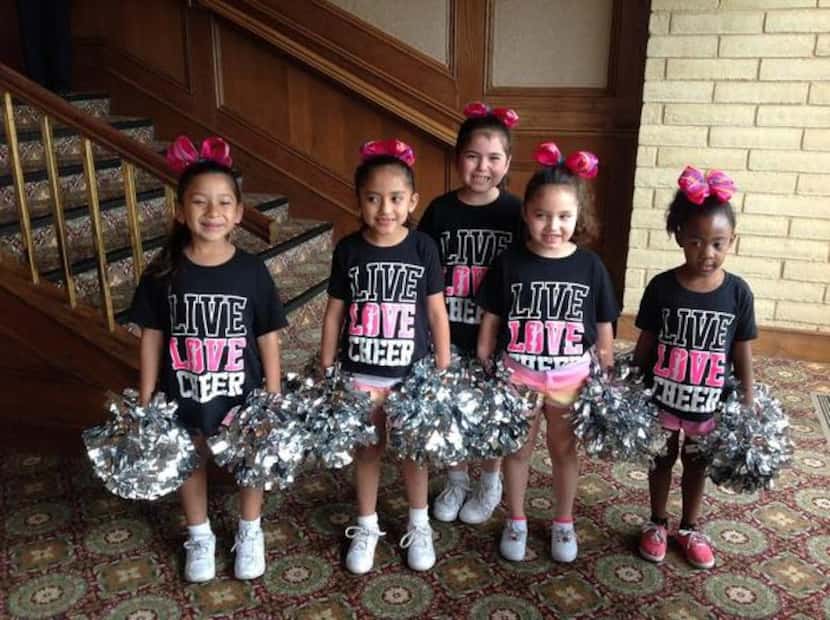 
Cheerleaders performed at the Soup, Soap and Hope Luncheon at Las Colinas Country Club.
