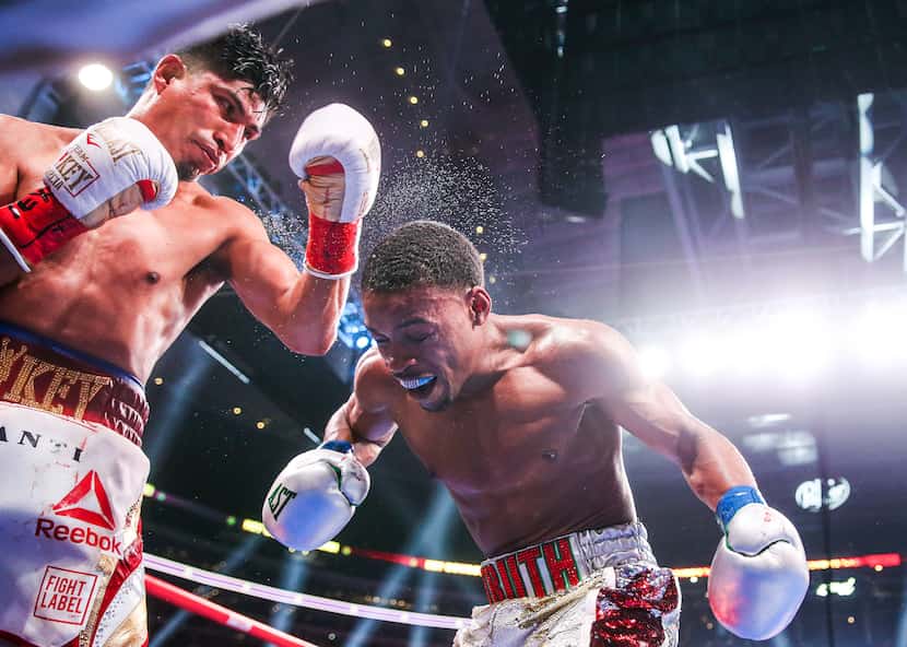 Mikey Garcia lands a shot on Errol Spence Jr. during a IBF World Welterweight Championship...
