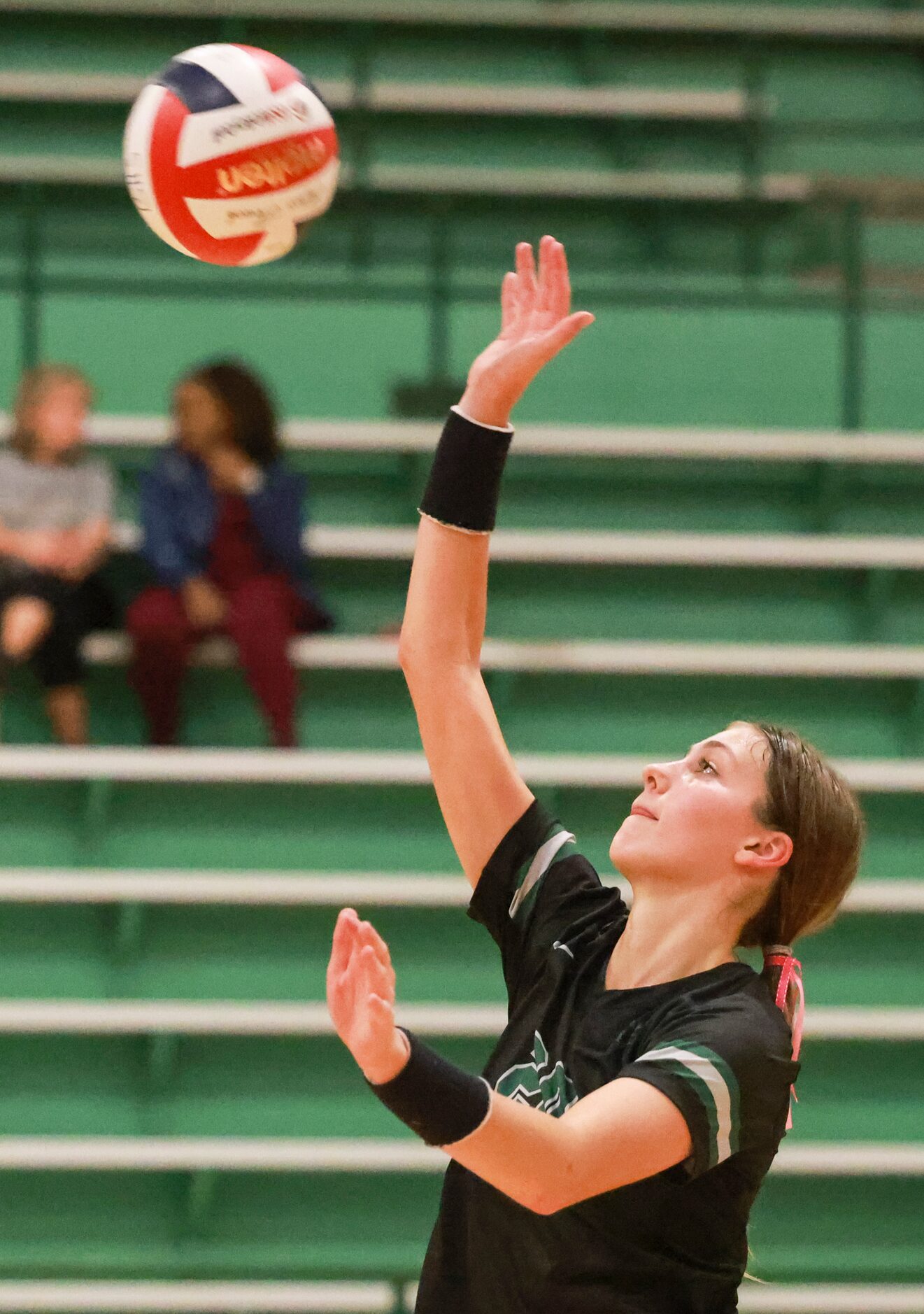 Lloyd V. Berkner High School STEM Academy Landry Baughman (20) spikes the ball during the...