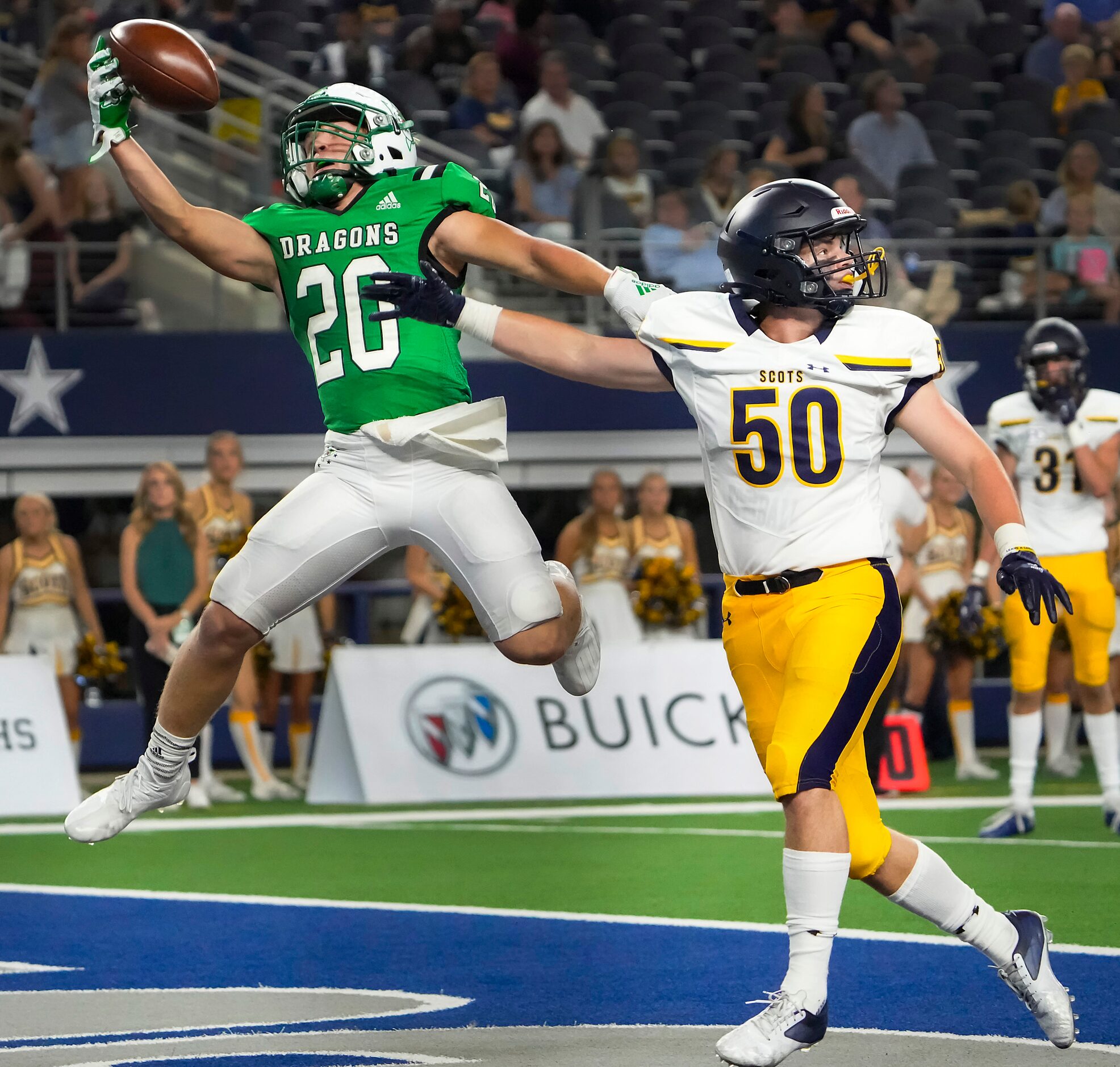 Southlake Carroll running back James Lehman (20) makes a one-handed catch for a touchdown as...