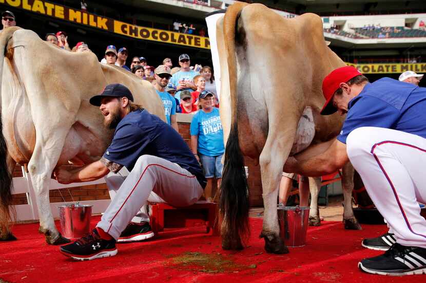 Texas Rangers pitcher Ross Ohlendorf (right) and Boston Red Sox pitcher Wade Miley competed...