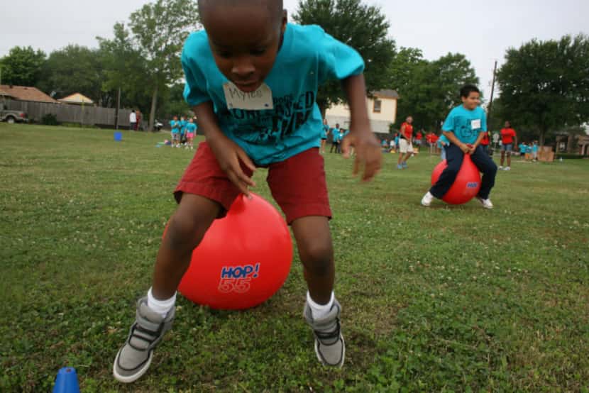 Mesquite's Shaw Elementary School gives students like Myles Harris an annual "Play Day" to...