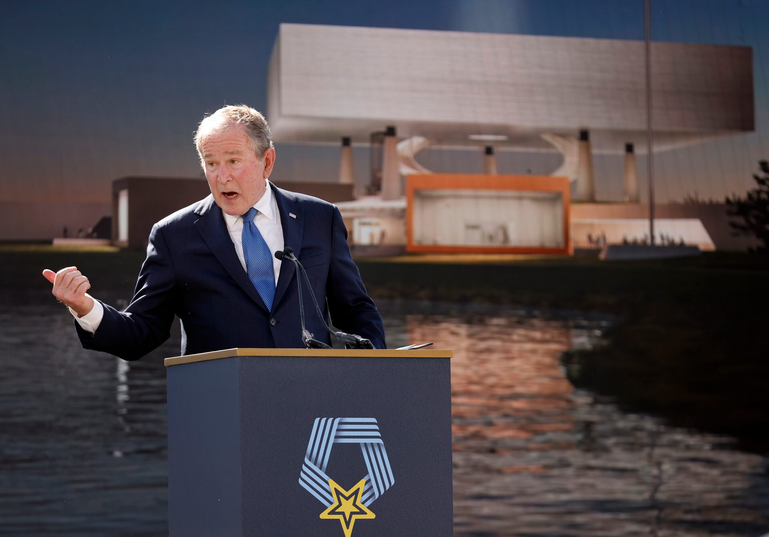 Former President George W. Bush speaks to the crowd gathered for the groundbreaking ceremony...