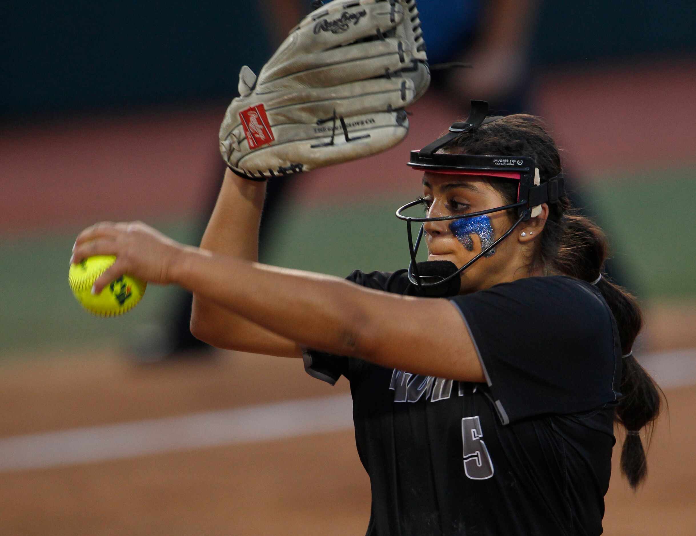 Denton Guyer pitcher Jenny Robledo (5) delivers a pitch to a Bridgeland batter during the...