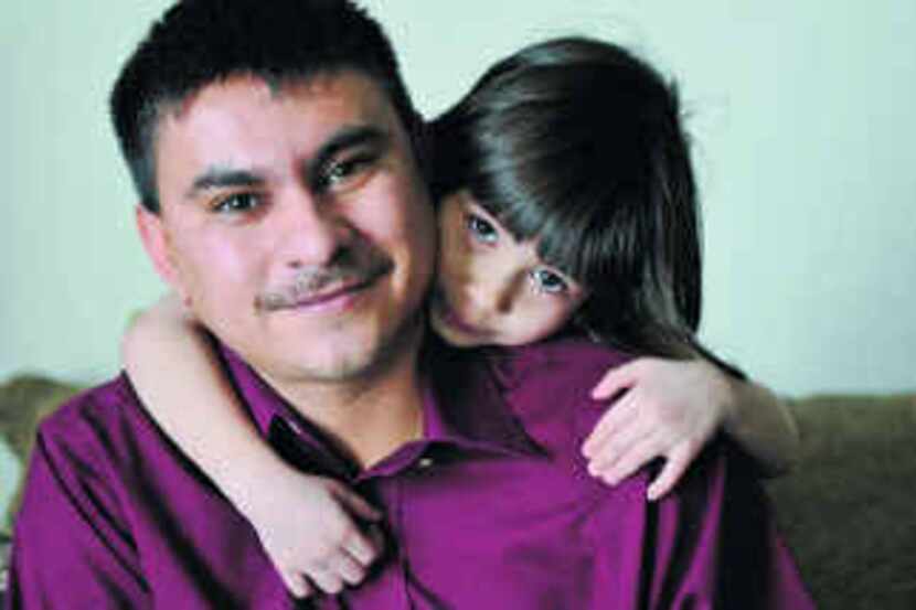  Jaime Chavez, with his 4-year-old daughter, Sara, is trying to build a new life for his...