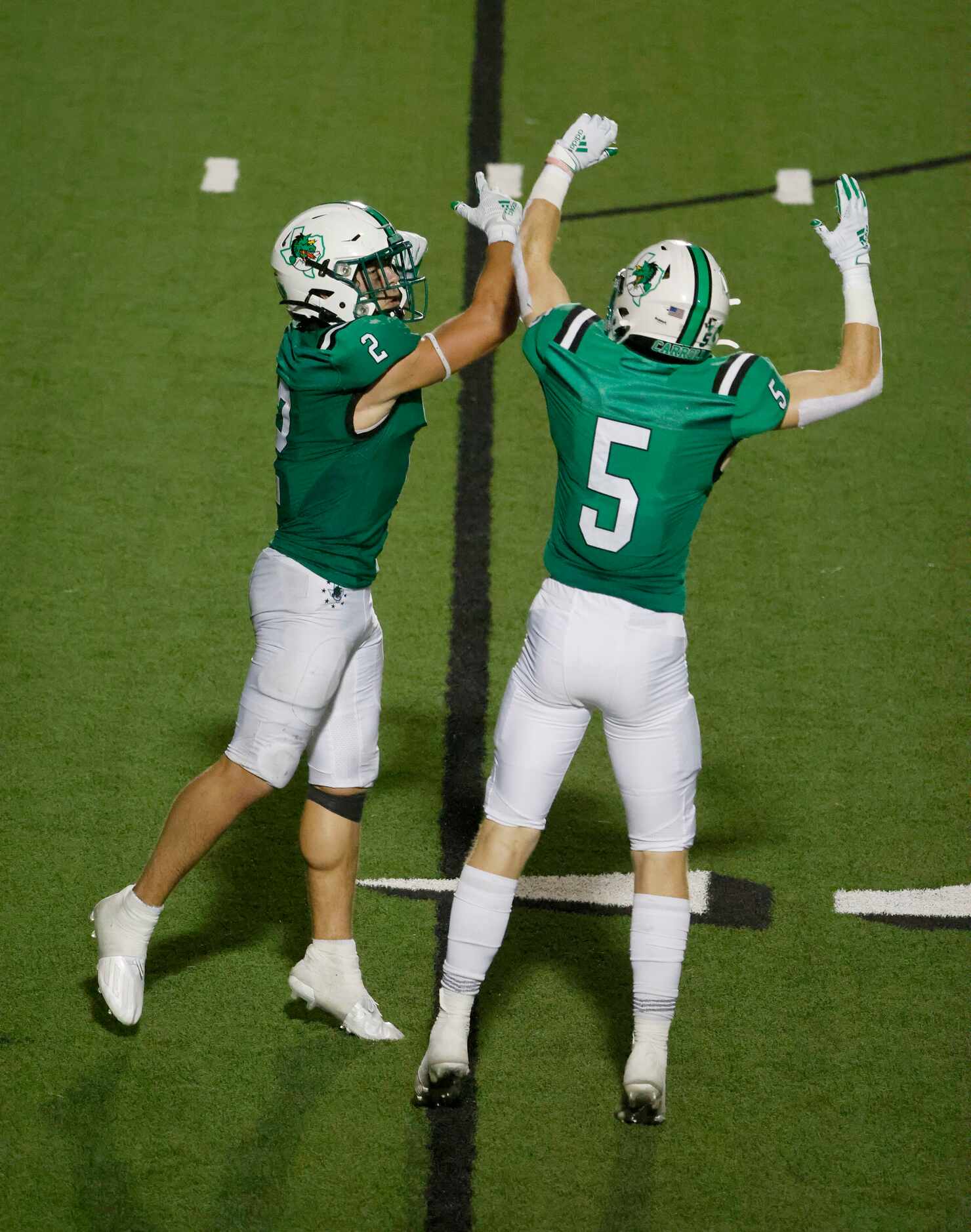 Southlake Carroll running back  Owen Allen  (2) celebrates his second rushing touchdown...