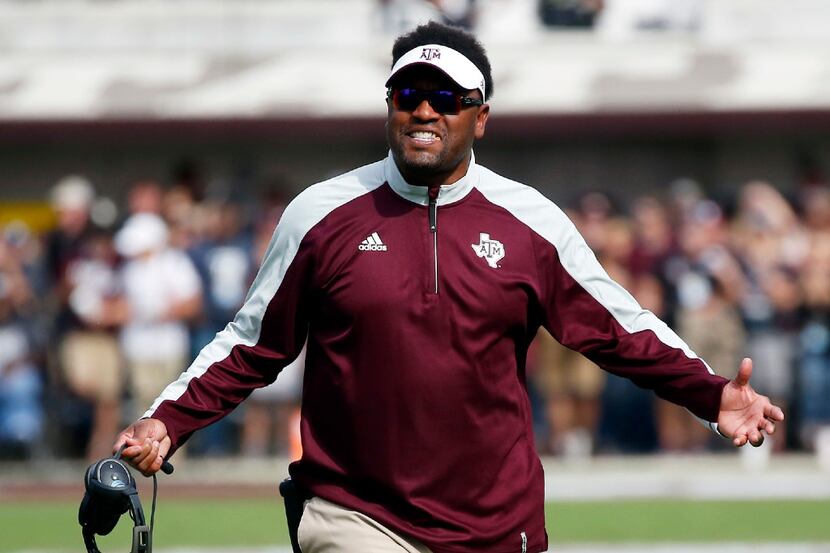Texas A&M head coach Kevin Sumlin reacts to a official's call in the first half of an NCAA...