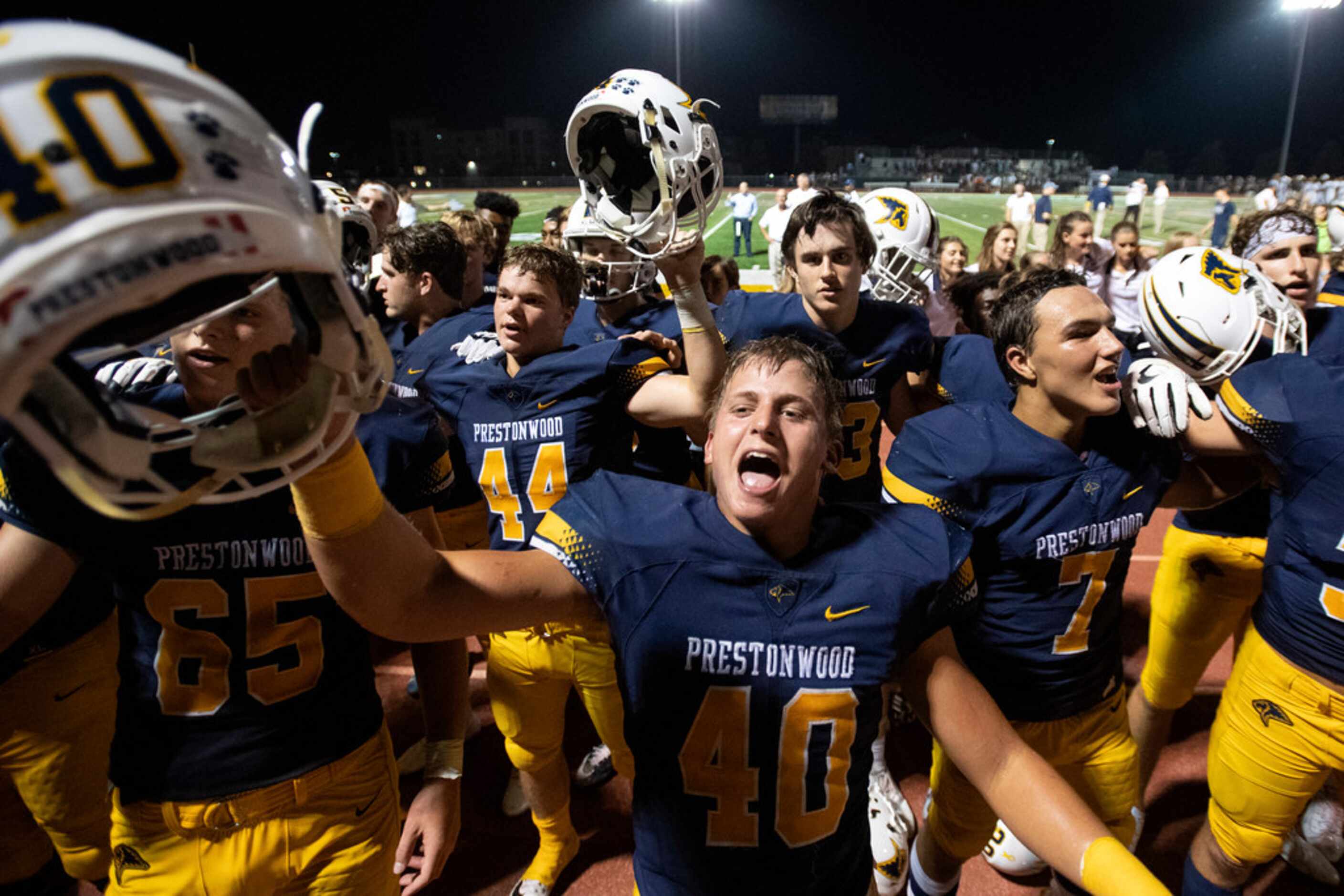 Plano Prestonwood Christian senior linebacker Walker Lunsford (40) and junior defensive back...