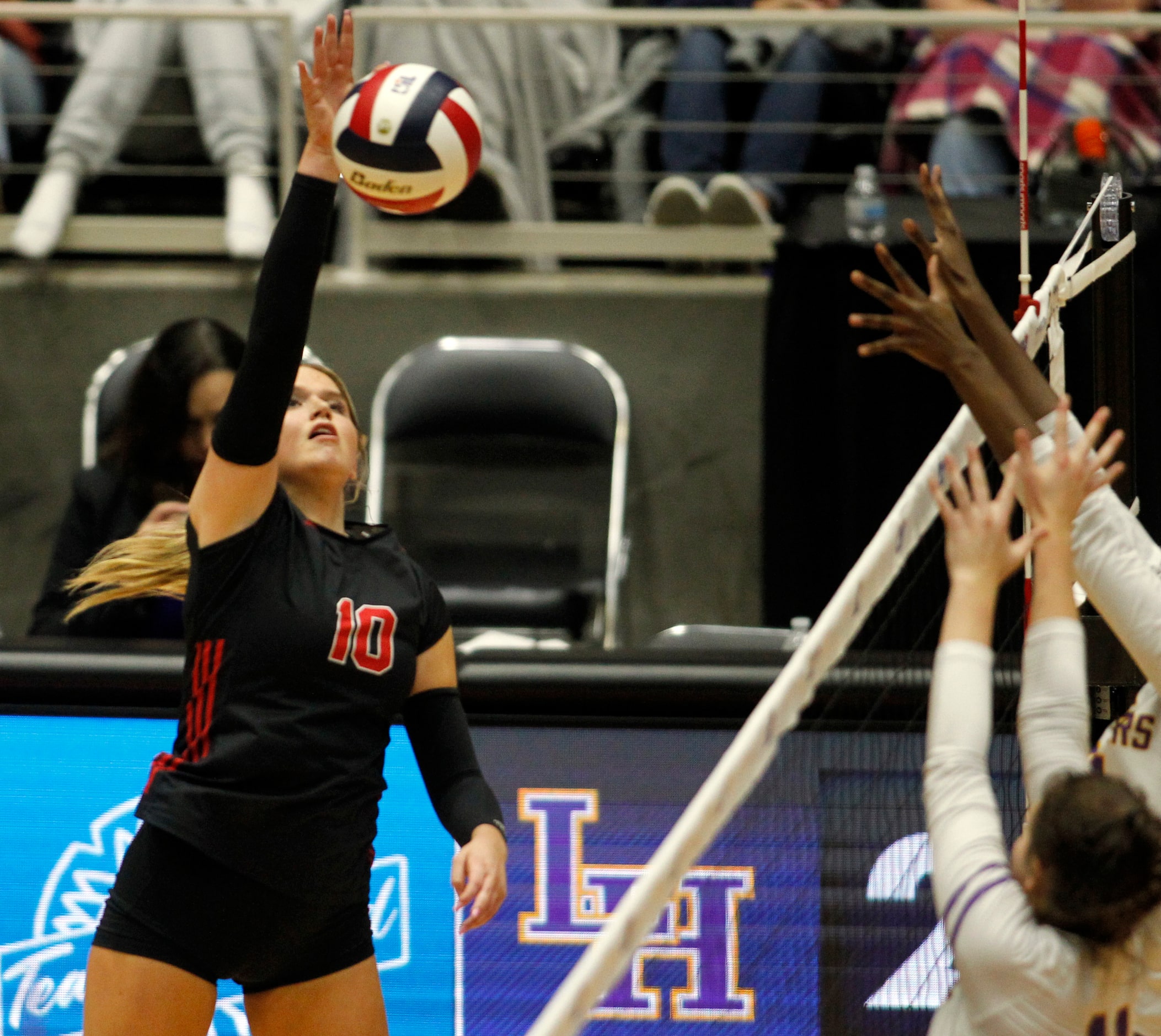 Lovejoy sophomore Skylar Jackson (10) fires the ball past Liberty Hill defenders during the...