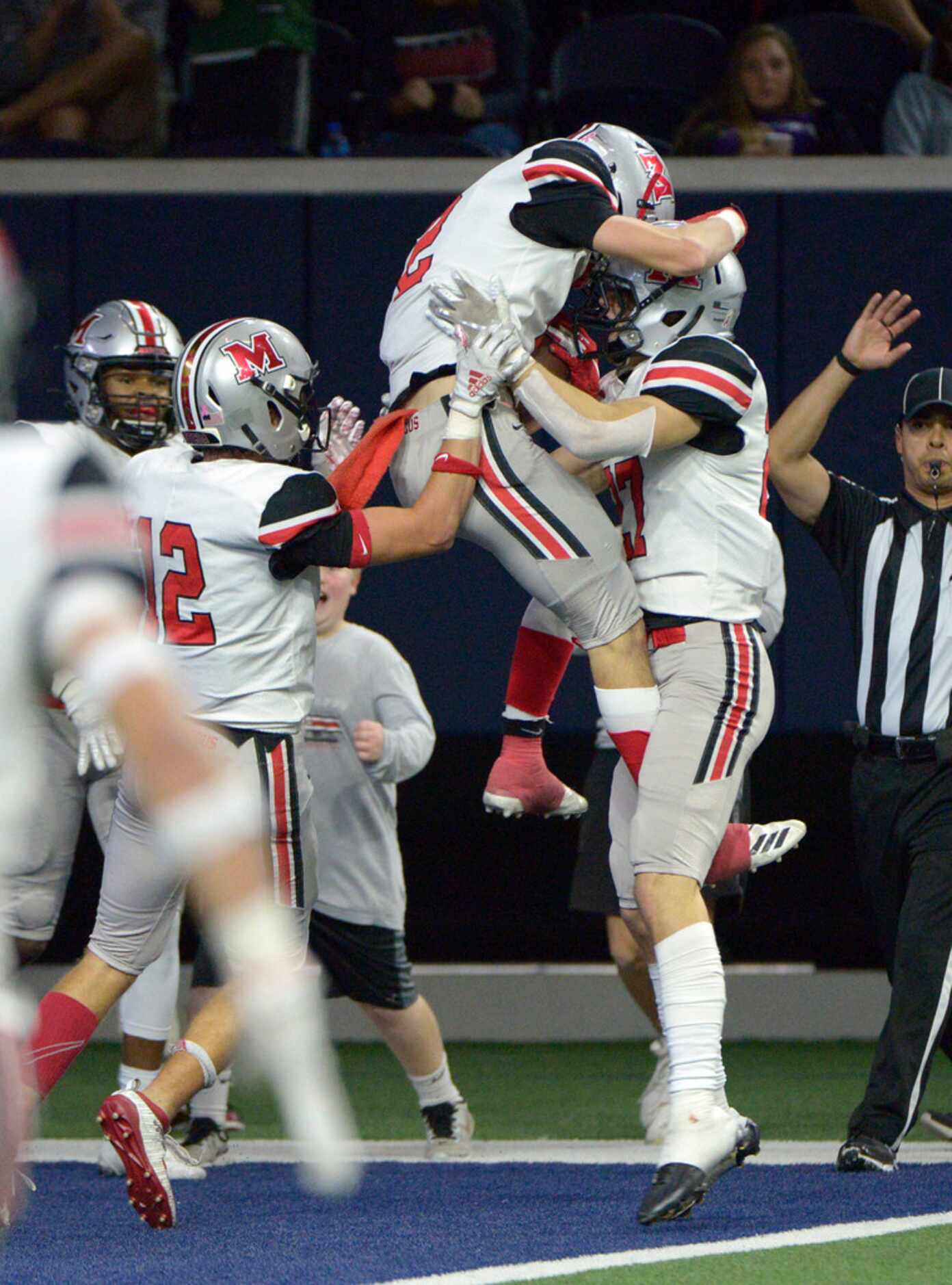 Flower Mound Marcus' Ty Johnson (2) celebrates his interception in the second half of a...