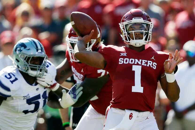 FILE - In this Oct. 27, 2018, file photo, Oklahoma quarterback Kyler Murray (1) throws in...