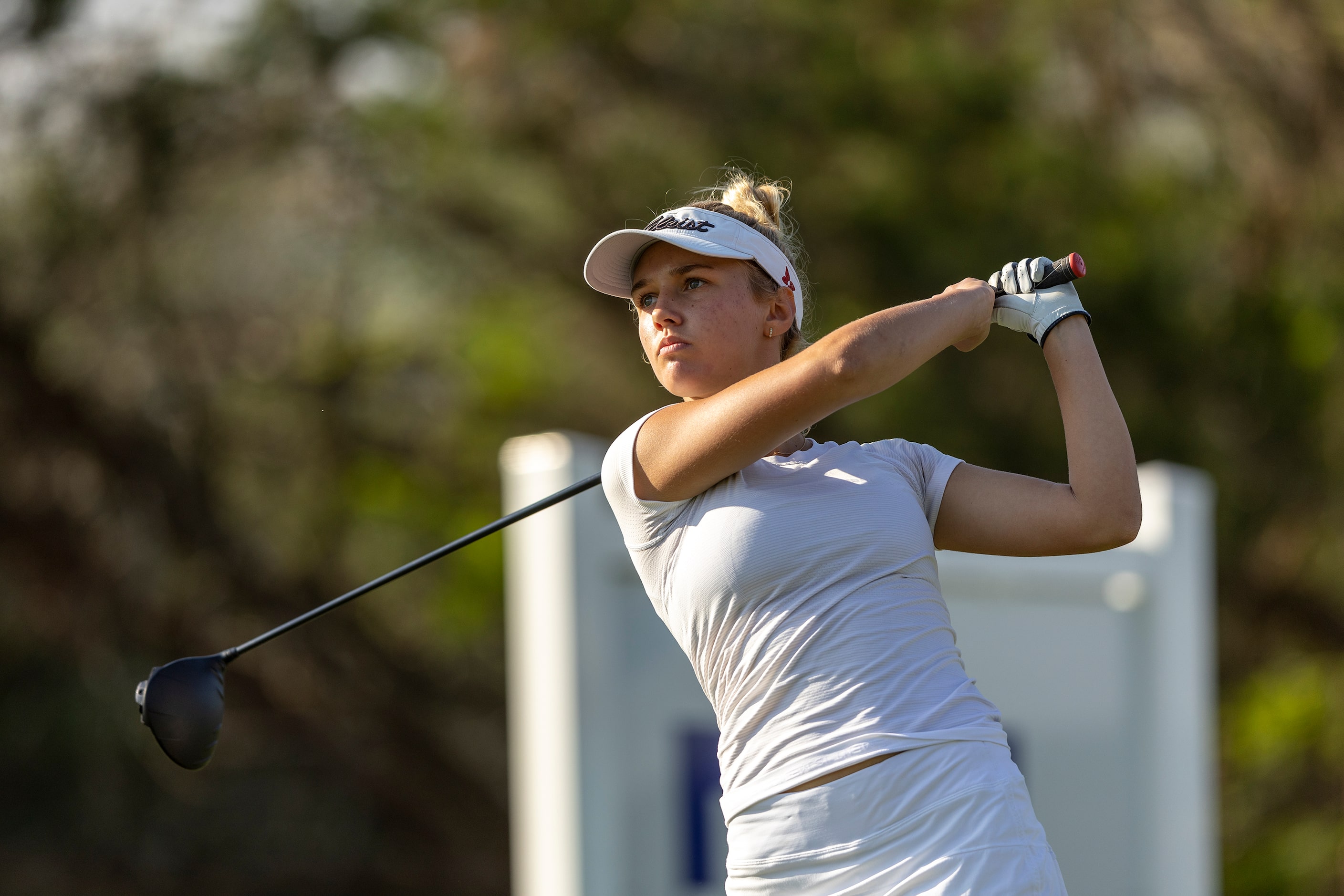 Highland Park’s Landry Saylor hits from the 1st tee box during the 5A girls state golf...