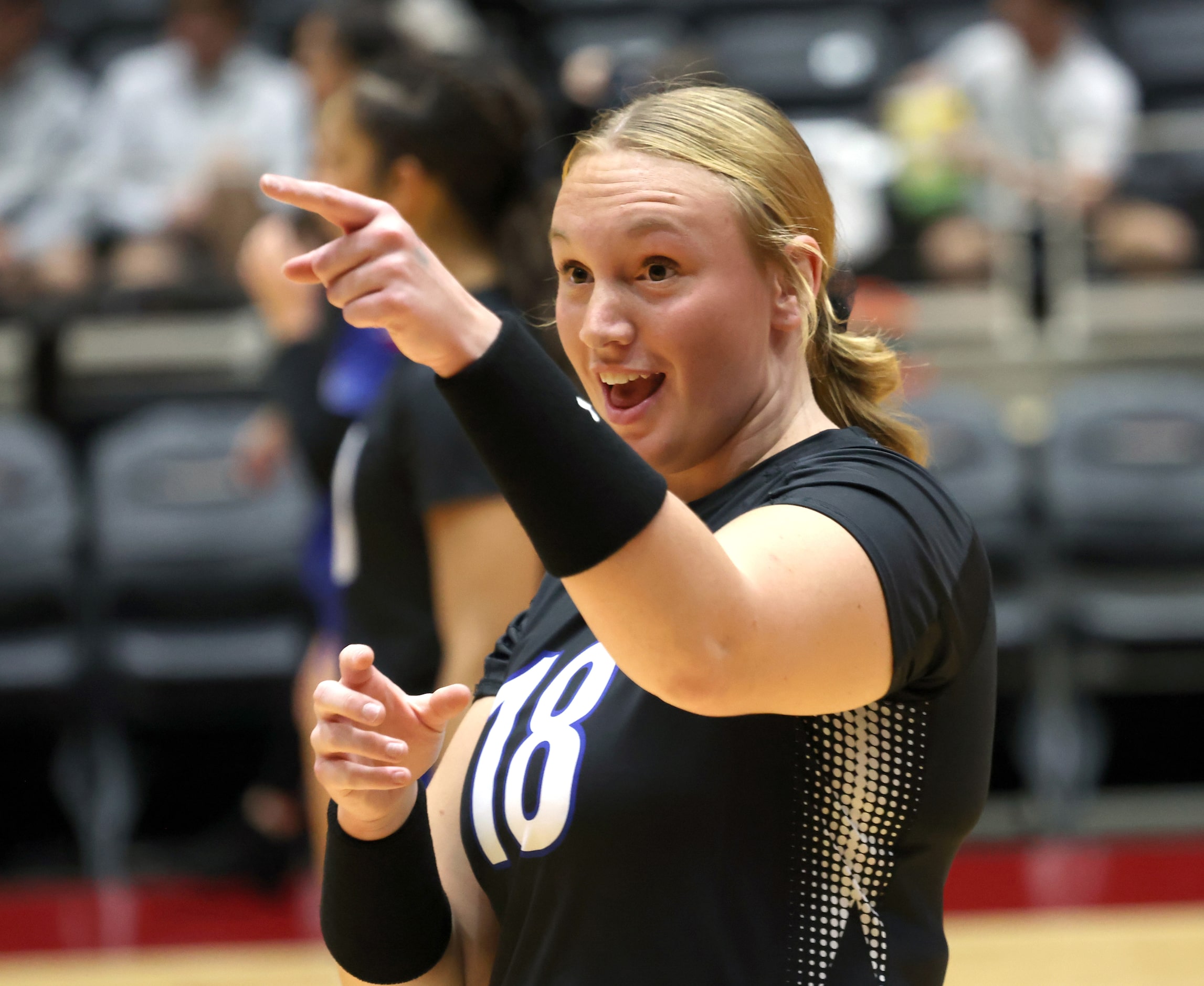 Byron Nelson junior Morgan Gardner (18) points out her target before tossing a miniature...