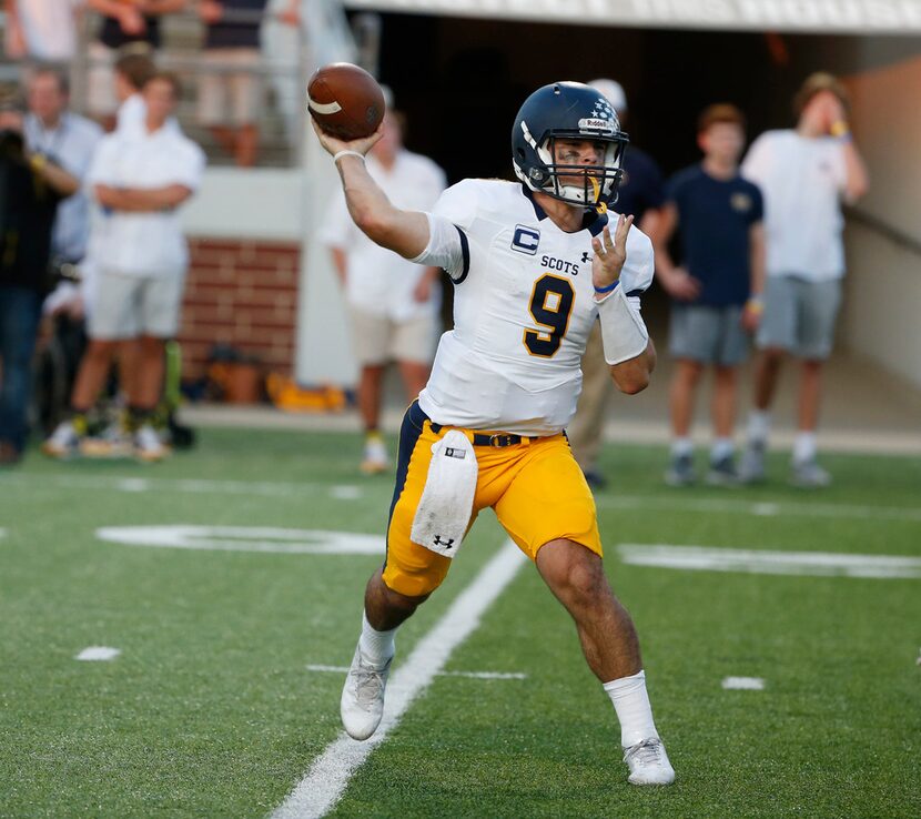 Highland Park quarterback John Stephen Jones (#9) throws a pass against Mansfield Timberview...