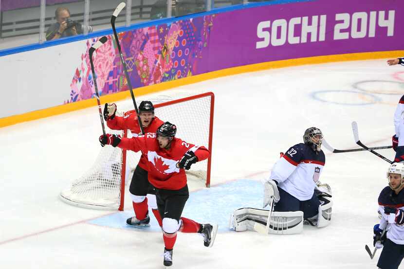 SOCHI, RUSSIA - FEBRUARY 21:  Jamie Benn #22 of Canada celebrates scoring a second-period...