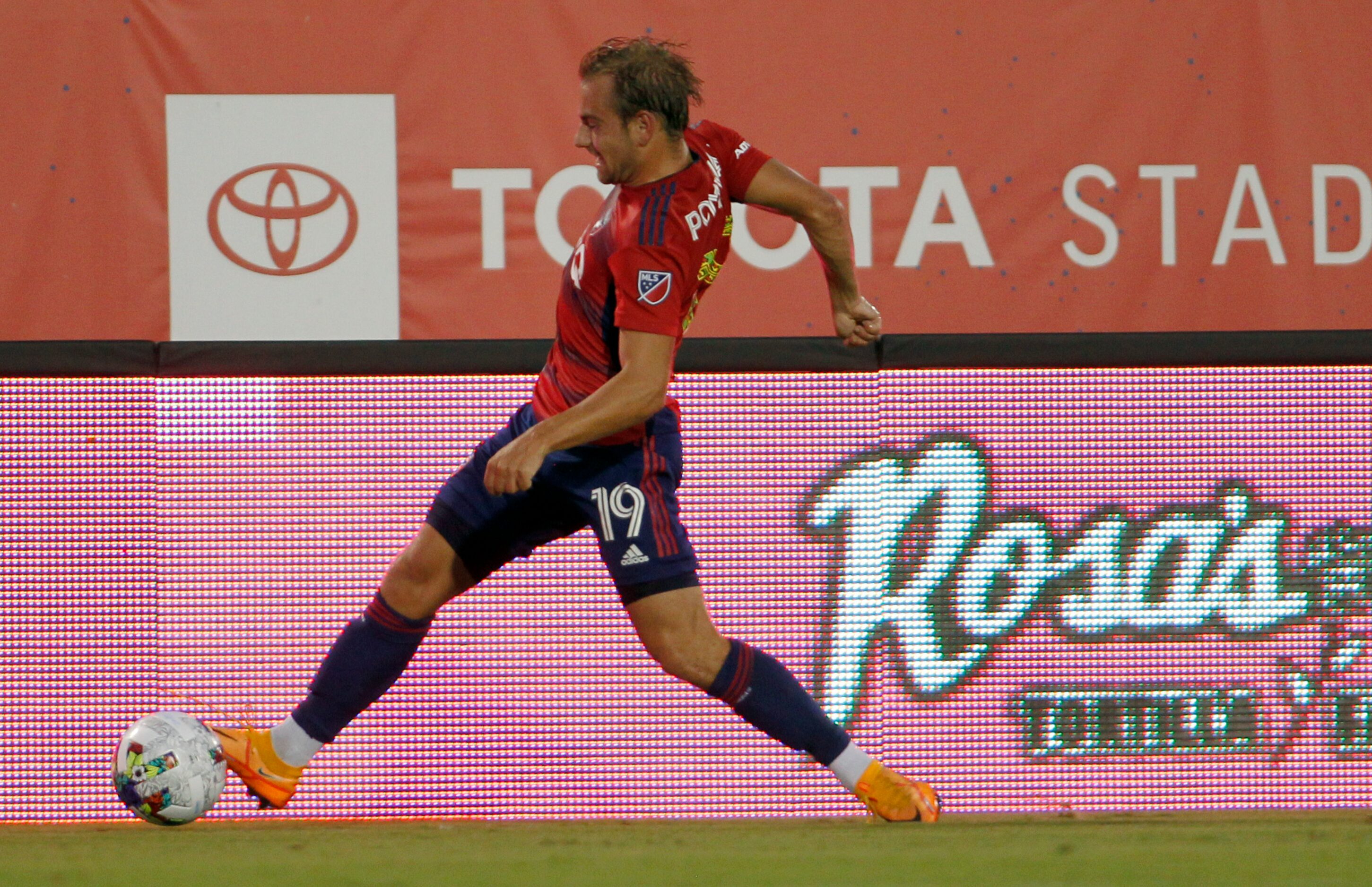 FC Dallas midfielder Paxton Pomykal (19) stretches out to save a long pass from going out of...