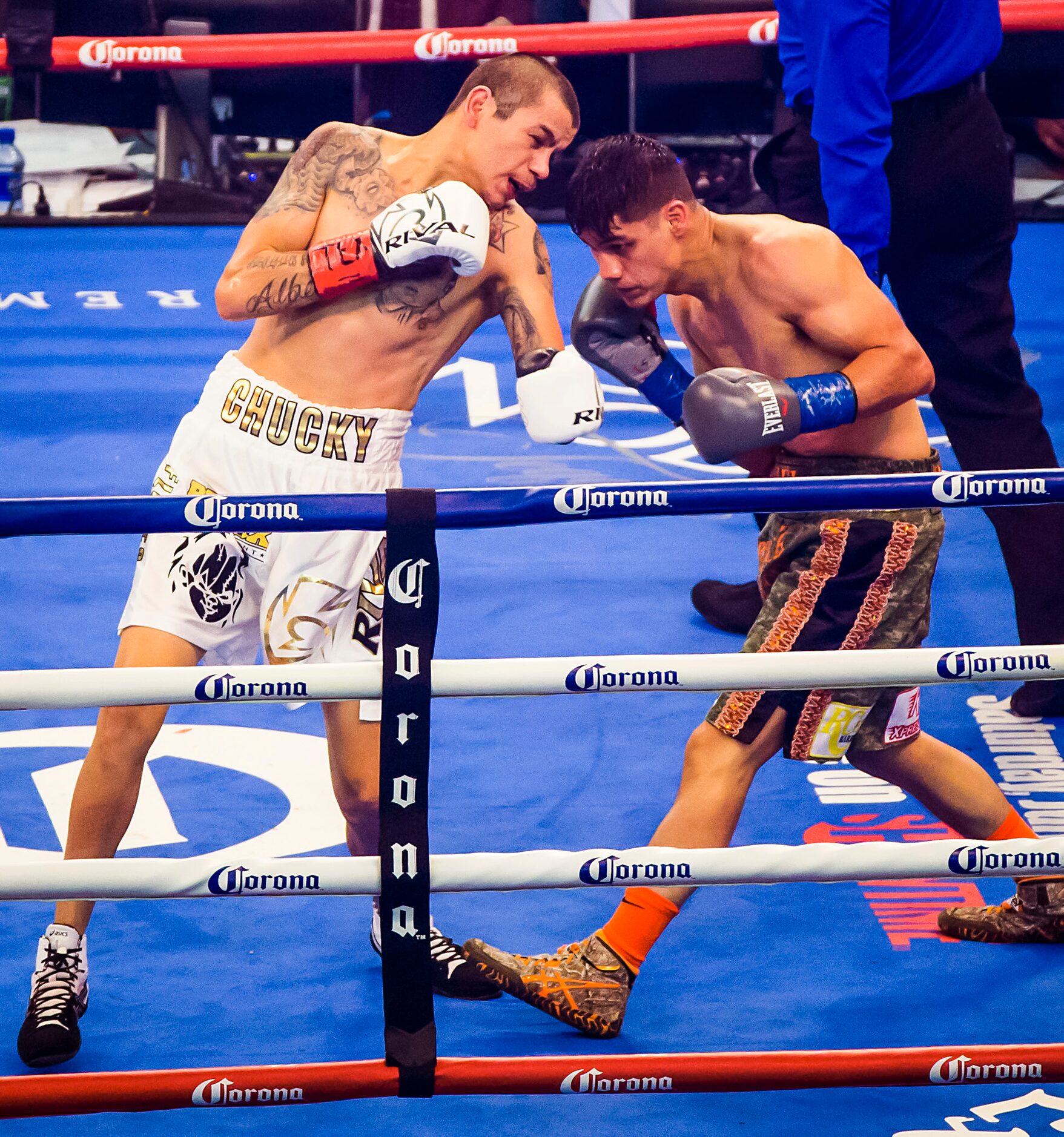 Daniel Roman (right), of Los Angeles, fights Moises Flores, of Guadalajara, Mexico, for the...