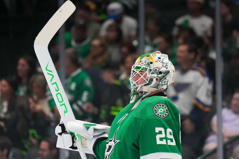 Dallas Stars goaltender Jake Oettinger looks on before a face off during the second period...