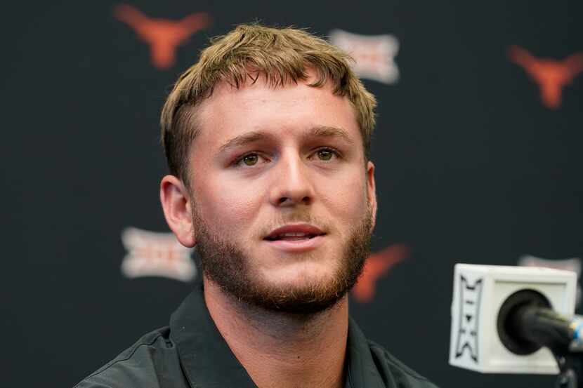 FILE - Texas quarterback Quinn Ewers speaks to reporters at the NCAA college football Big 12...