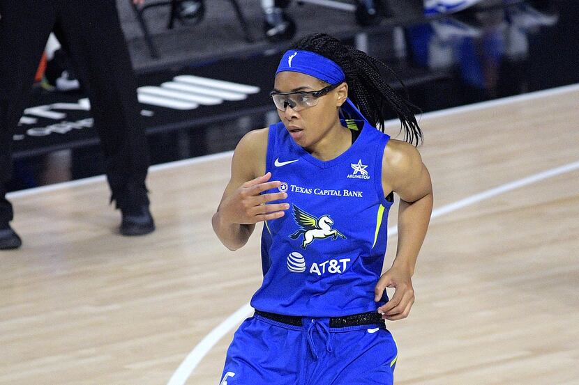 Dallas Wings guard Allisha Gray reacts after a play during the second half of a WNBA...