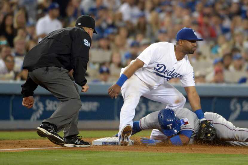 Jun 18, 2015; Los Angeles, CA, USA; Los Angeles Dodgers third baseman Alberto Callaspo (5)...
