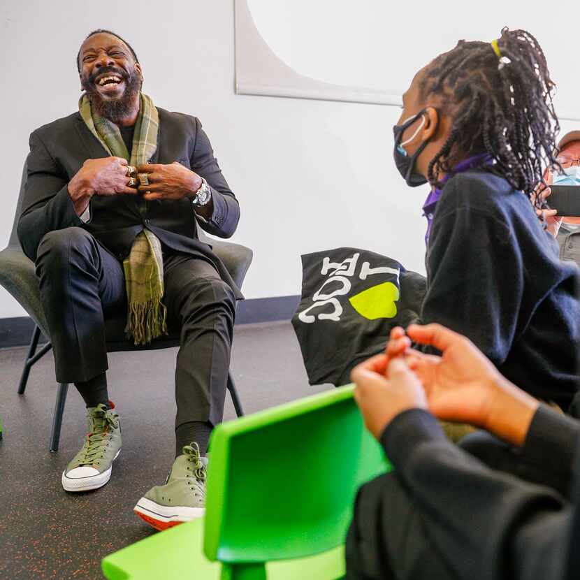 WWE Hall of Famer Booker T visits with students at For Oak Cliff community center for a...