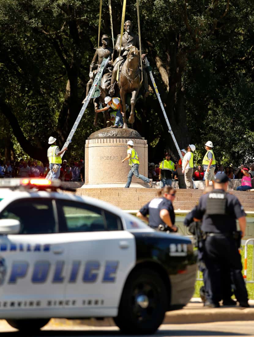Crews from Howell Crane and Rigging, Inc tried to remove the Robert E. Lee statue with a...