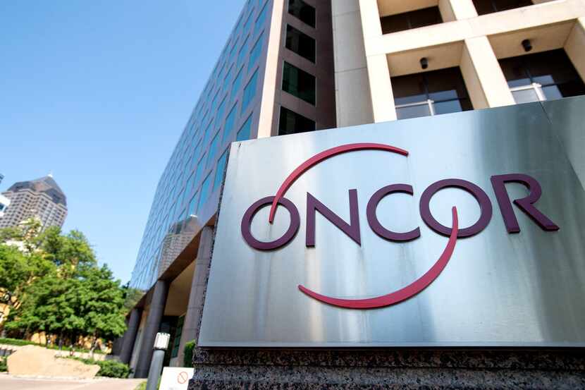 A sign displays the Oncor logo outside the company's corporate headquarters, Wednesday May...