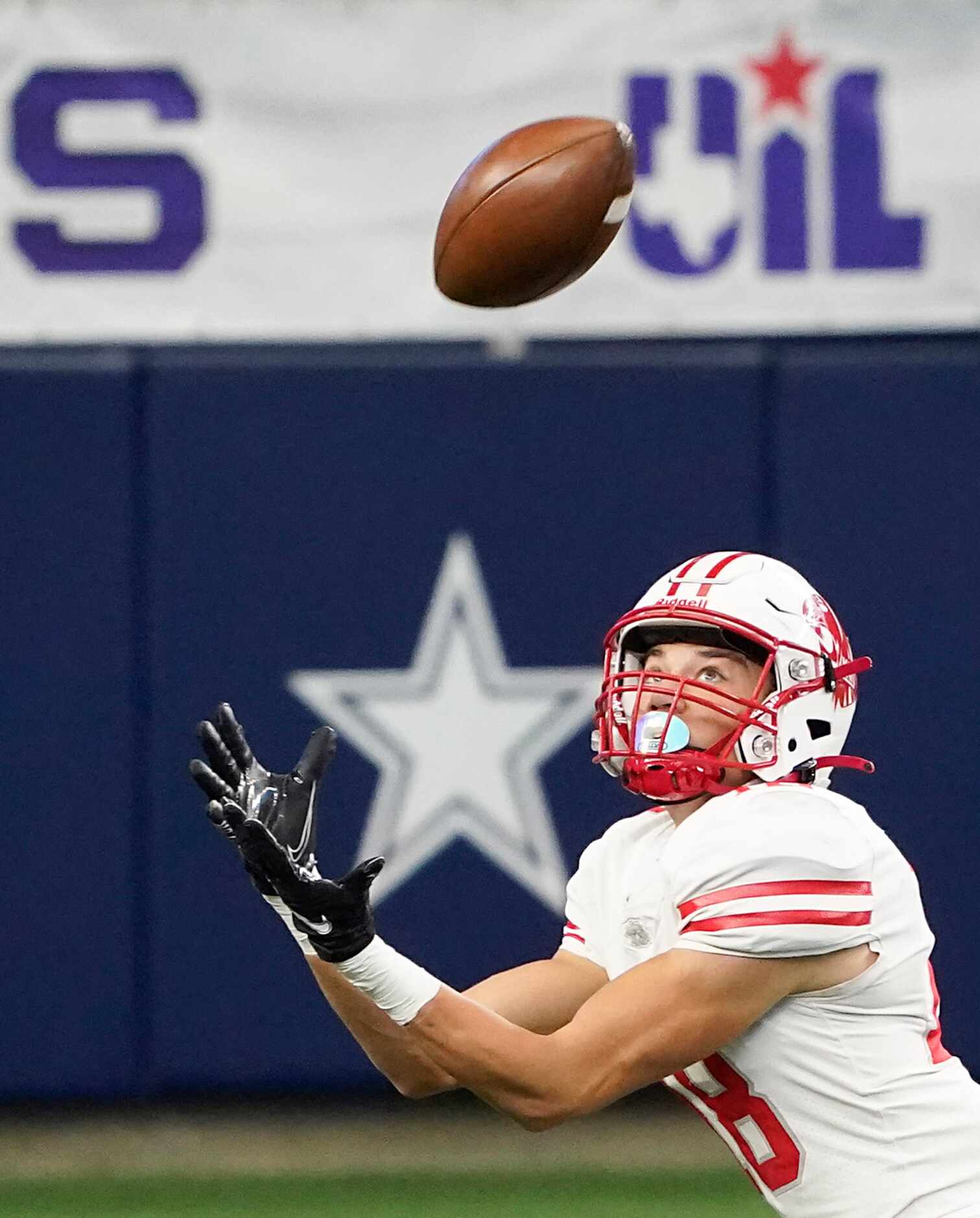 Katy wide receiver Taylor Saulsberry hauls in a  37-yard touchdown pass during the first...