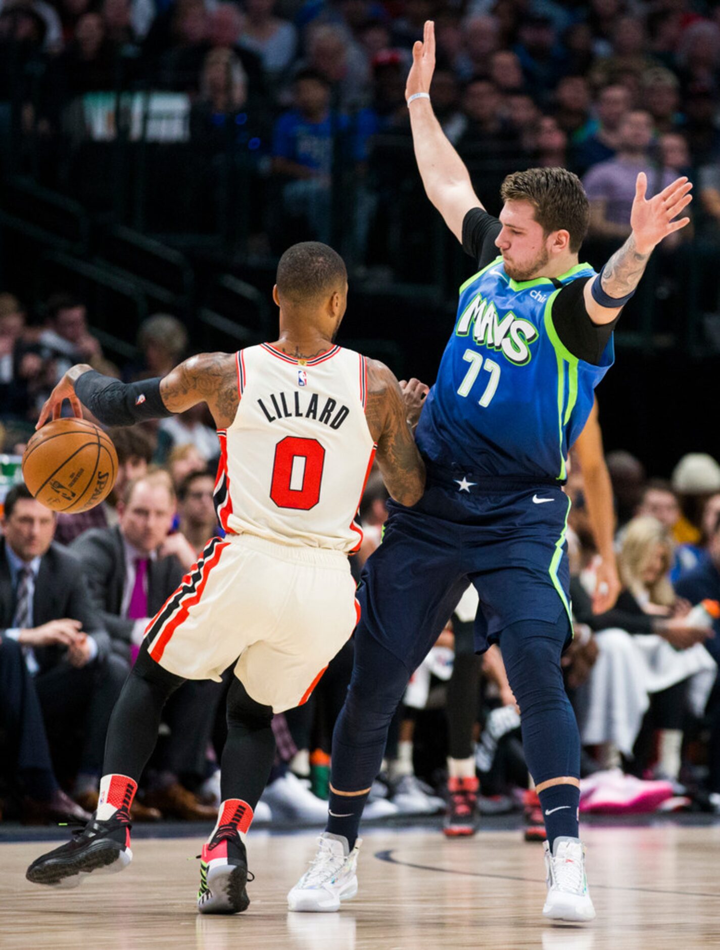 Dallas Mavericks forward Luka Doncic (77) defends against Portland Trail Blazers guard...