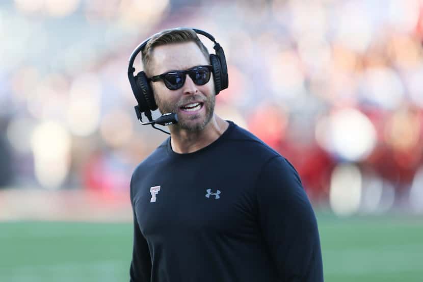 Texas Tech coach Kliff Kingsbury reacts to a play during the NCAA college football game...
