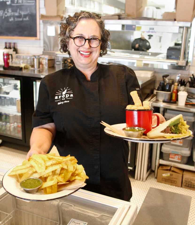 Mary Ann Allen,owner and chief, Arepa TX serves a brisket and chimichurri arepa with fried...